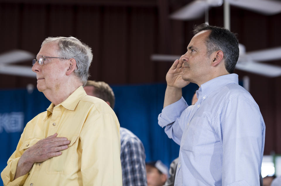 Senate Majority Leader Mitch McConnell (R-Ky.) and Kentucky Gov. Matt Bevin stand during the National Anthem at the annual Fancy Farm Picnic in Fancy Farm, Kentucky, on Aug. 6, 2016. (Photo: Bill Clark via Getty Images)