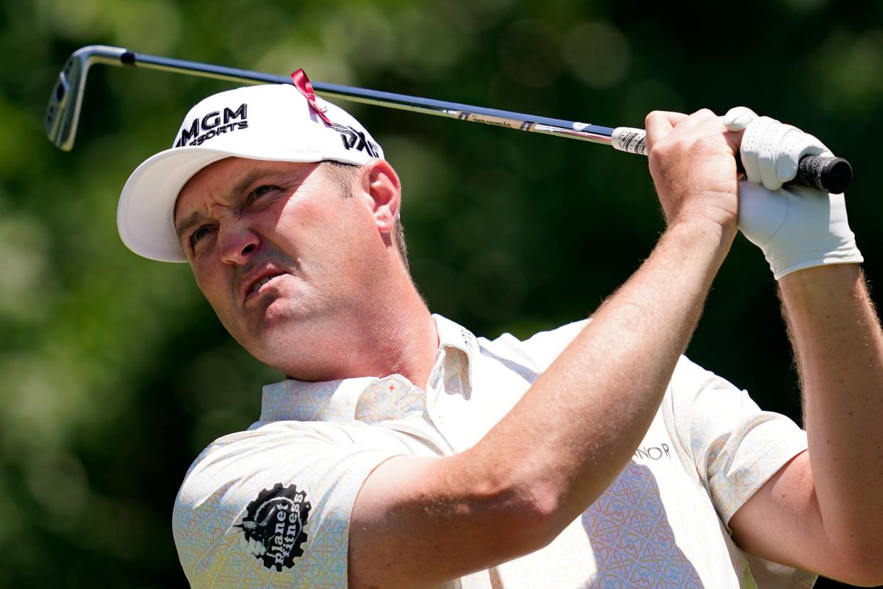 Jason Kokrak hits off the eighth tee during the first round of the Charles Schwab Challenge golf tournament at the Colonial Country Club, Thursday, May 26, 2022, in Fort Worth, Texas. (AP Photo/Tony Gutierrez)