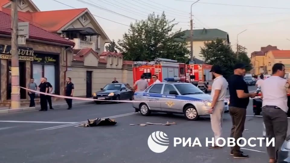 This screen grab from a RIA Novosti video shows police on scene following an attack in Makhachkala, Dagestan, Russia, on June 23. - RIA Novosti