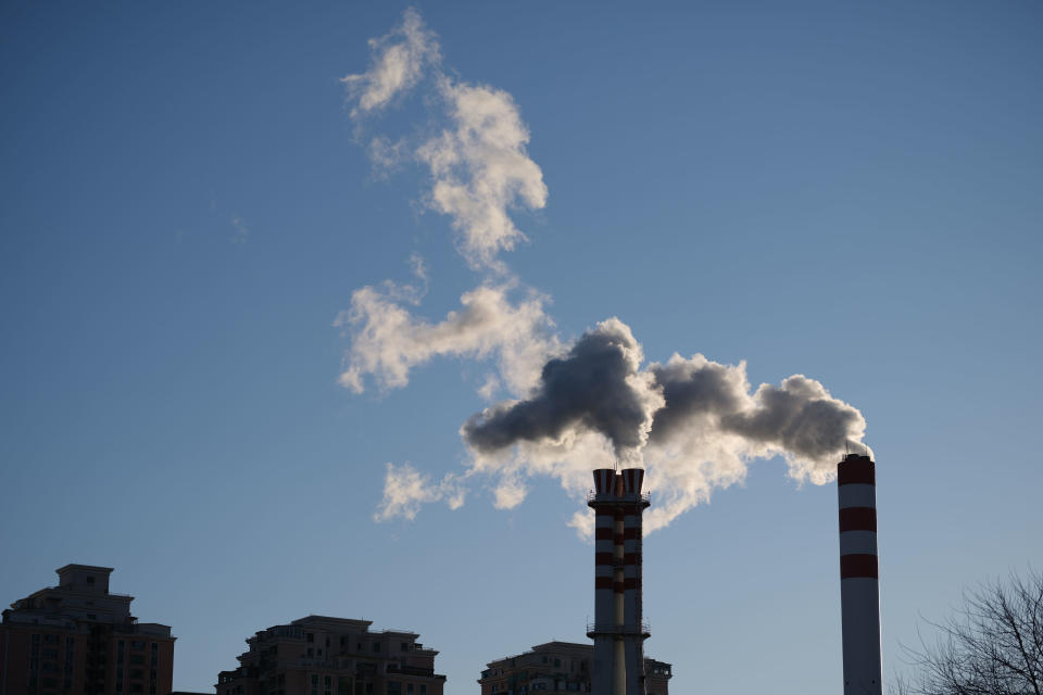 Smoke rises from a chimney in Beijing