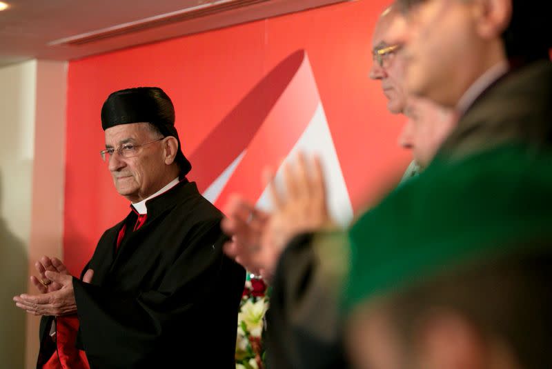 FILE PHOTO: Lebanese Maronite Patriarch Bechara Boutros Al-Rahi claps as he visits the Lebanese embassy in Riyadh