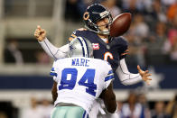 Jay Cutler #6 of the Chicago Bears fumbles the ball as he is sacked by DeMarcus Ware #94 of the Dallas Cowboys in the third quarter at Cowboys Stadium on October 1, 2012 in Arlington, Texas. (Photo by Ronald Martinez/Getty Images)