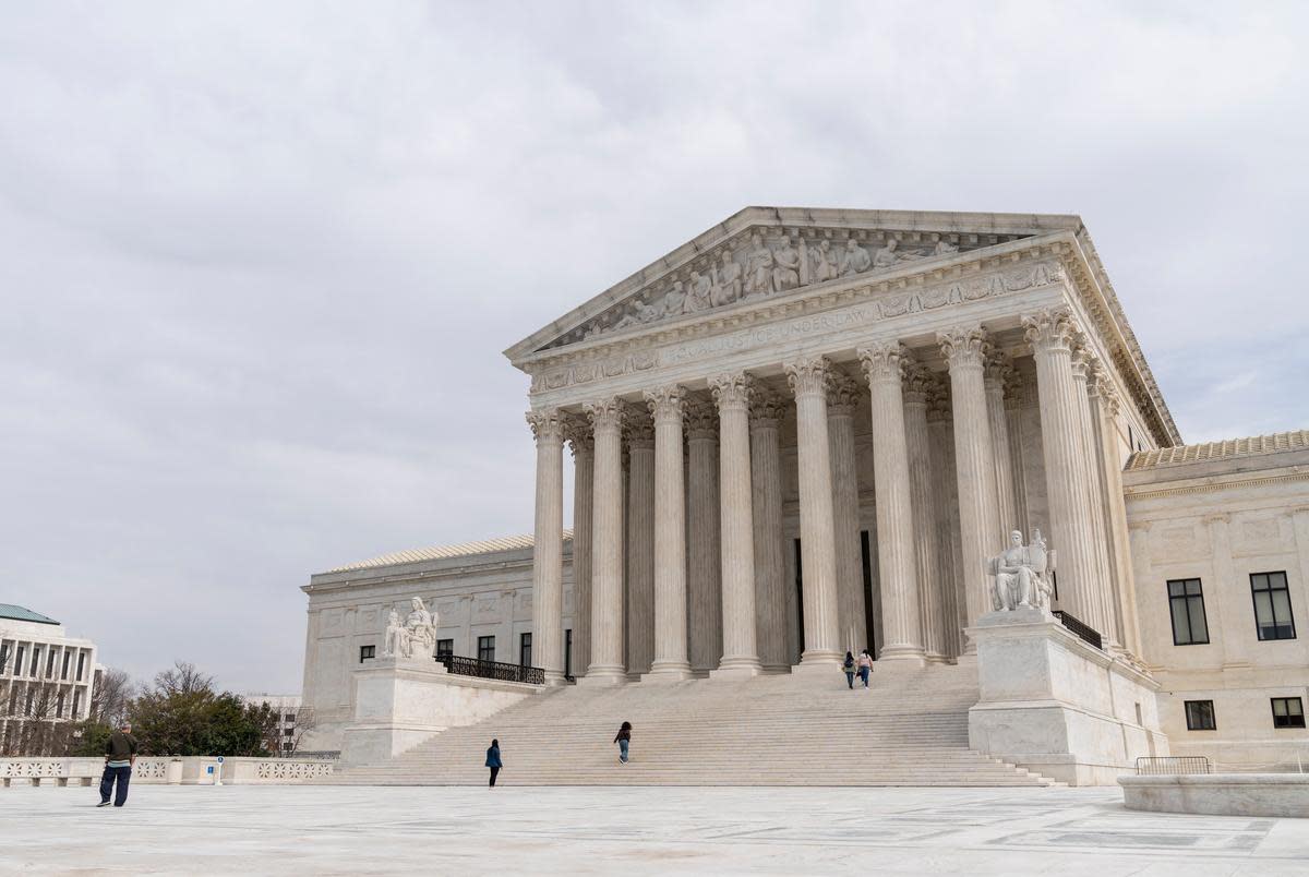 People visit the Supreme Court in Washington, D.C. on March 10, 2022.