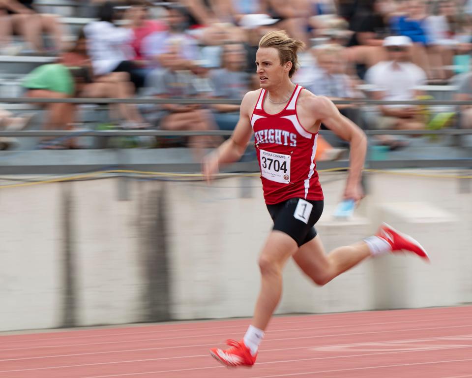 Shawnee Heights Payton Berry-Briggs competes in the 4x400 meter relay Saturday May. 27, 2023, during state track at Cessna Stadium in Wichita, Kan.