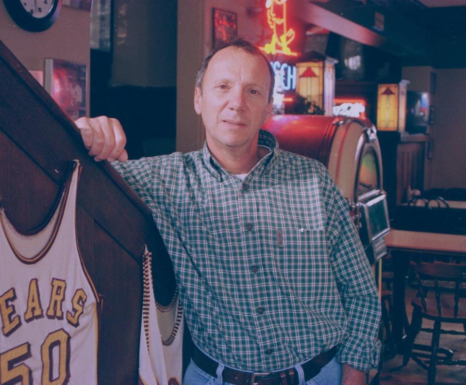 Nick Russo, the original owner of Ebbets Field, poses for a photo inside the restaurant in 1999.