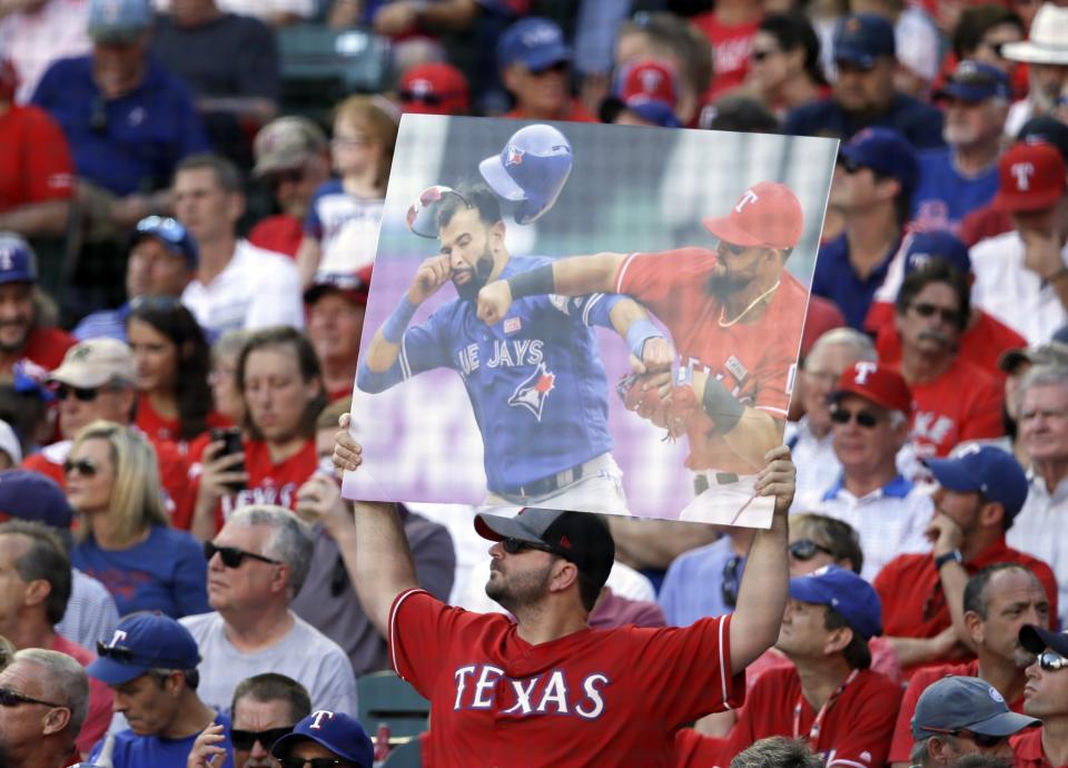 Rangers fans came ready to remind everyone about The Punch. (AP)