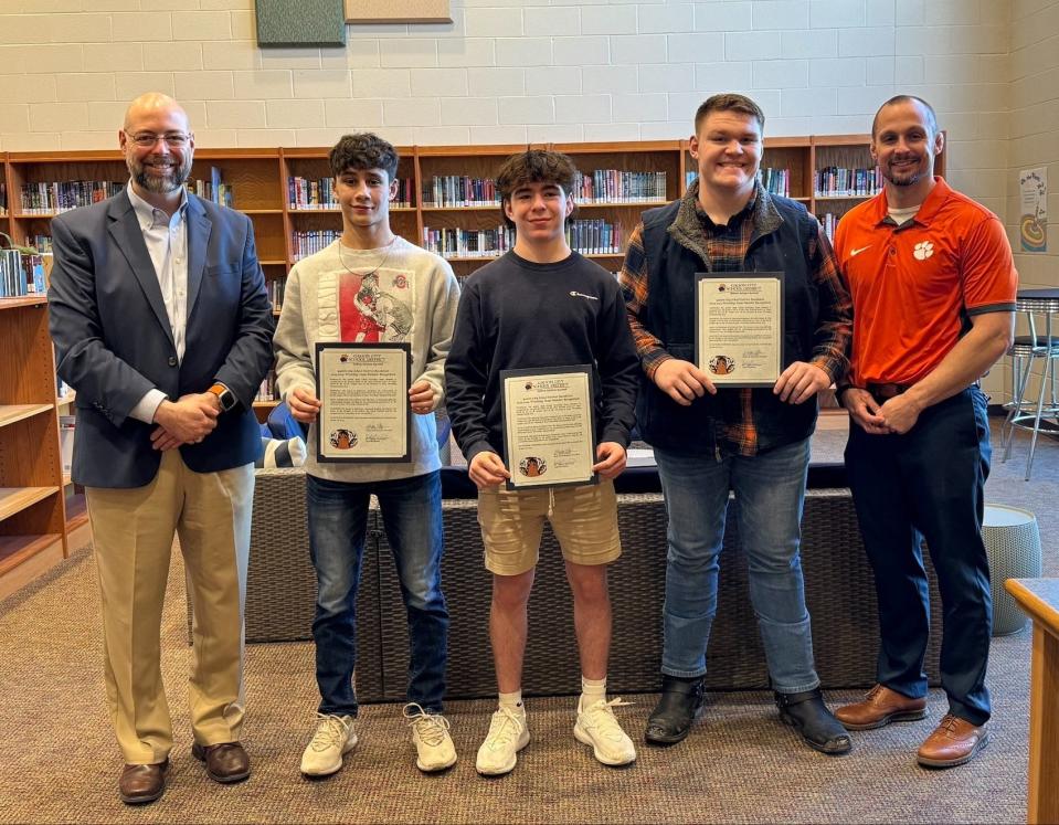 Galion All-Ohio wrestlers were recognized at the March 20 meeting of the Galion Board of Education. Superintendent Jeff Hartmann, left, Carter Trukovich, Gradey Harding, Alex Griffith and Athletic Director Matt Tyrrell were at the meeting.