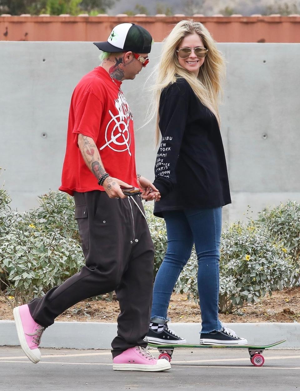 <p>Avril Lavigne and Mod Sun hang at a skate park in Los Angeles on June 17.</p>