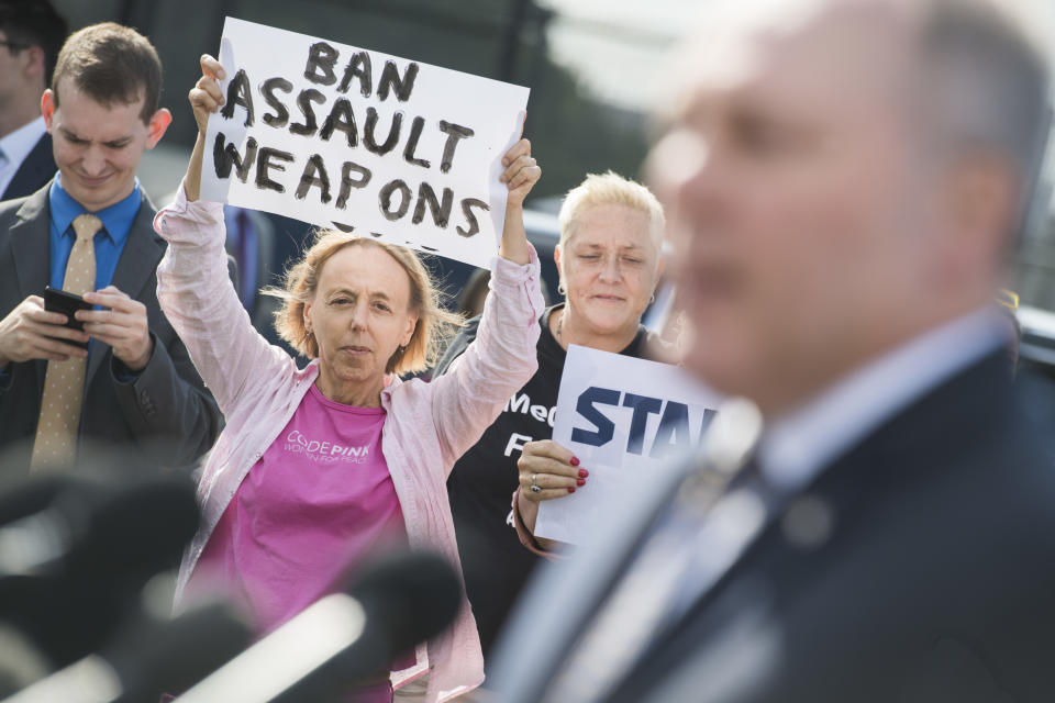 Medea Benjamin of Code Pink, holds an anti assault weapon sign while House Minority Whip Steve Scalise, R-La., speaks during a news conference on the gun control debate and to support the Second Amendment outside of the Capitol on Sept. 18, 2019. (Photo: Tom Williams/CQ Roll Call/Getty Images)           