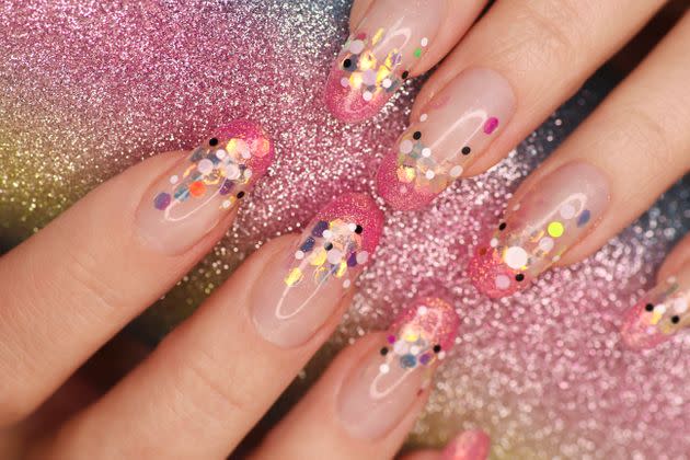 Don't make a habit of regularly using clip-on nails or getting acrylics, dermatologists say. (Photo: Kirezhenkova Marina / EyeEm via Getty Images)