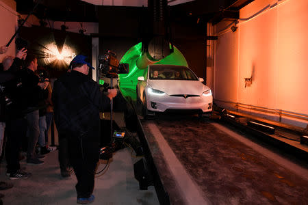 Elon Musk, co-founder and chief executive officer of Tesla Inc., arrives in a modified Tesla Model X electric vehicle during an unveiling event for the Boring Co. Hawthorne test tunnel in Hawthorne, California, U.S., December 18, 2018. Robyn Beck/Pool via REUTERS