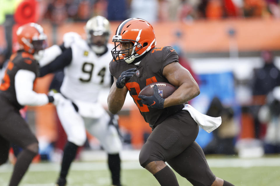 Cleveland Browns running back Nick Chubb (24) rushes during the second half of an NFL football game against the New Orleans Saints, Saturday, Dec. 24, 2022, in Cleveland. (AP Photo/Ron Schwane)