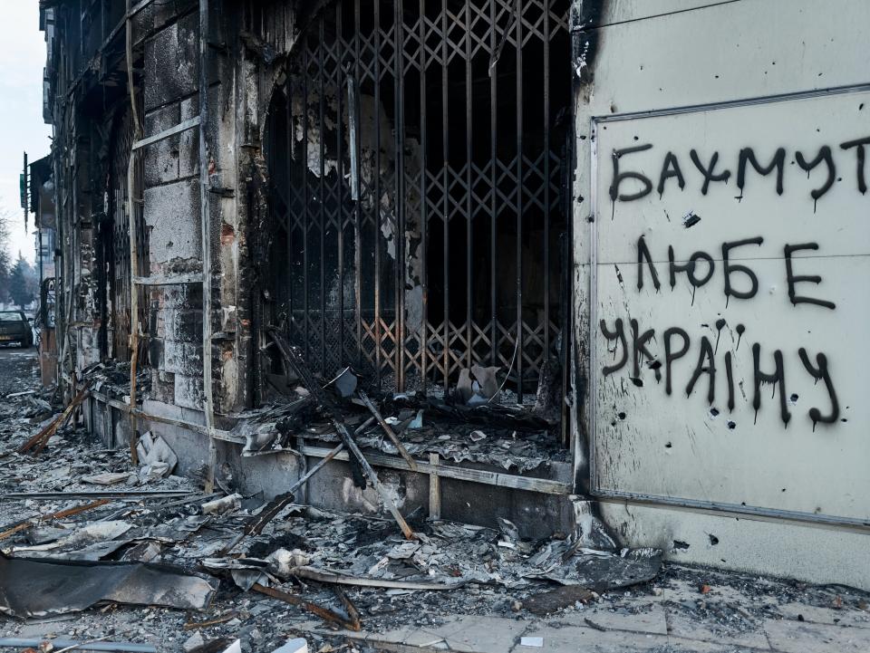 The writing on the wall reads ‘Bakhmut loves Ukraine’ (AP)
