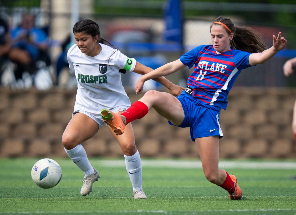 Westlake defender Ade Nelson attempts to tackle prosper forward Brooklyn Miller in the first half of the Conference 6A UIL State Championships at Birkelbach Field in Georgetown, Saturday, April 13, 2024. Prosper beat Westlake 1-0.