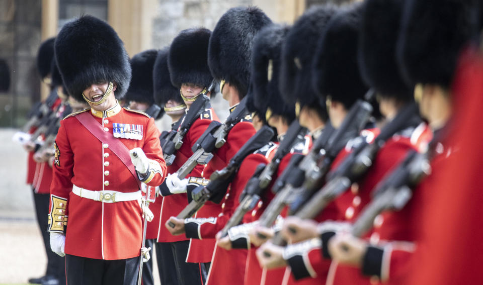 <p>WINDSOR, ENGLAND - JUNE 13: A warrant officer shouts instructions as he inspects the line of a Guard of Honour formed of The Queen's Company First Battalion Grenadier Guards at Windsor castle on June 11, 2021 in Windsor, England.  Queen Elizabeth II hosts US President, Joe Biden and First Lady, Dr Jill Biden, at Windsor Castle. The President arrived from Cornwall where he attended the G7 Leader's Summit and will travel on to Brussels for a meeting of NATO Allies and later in the week he will meet President of Russia, Vladimir Putin. (Photo by Richard Pohle-WPA Pool/Getty Images)</p>
