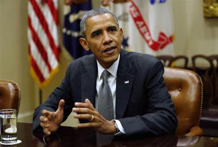 U.S. President Barack Obama holds a meeting with small business owners at the White House in Washington October 11, 2013. REUTERS/Kevin Lamarque