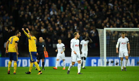 Soccer Football - Champions League Round of 16 Second Leg - Tottenham Hotspur vs Juventus - Wembley Stadium, London, Britain - March 7, 2018 Juventus’ Gonzalo Higuain and Giorgio Chiellini celebrate after Paulo Dybala scores their second goal as Tottenham's Christian Eriksen looks dejected REUTERS/Dylan Martinez