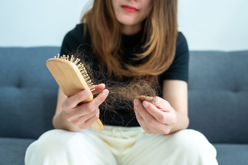 Hair loss can be caused by family history, hormonal changes or a poor diet -Credit:BOY_ANUPONG