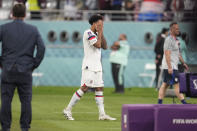 Weston McKennie of the United States leaves the pitch at the end of the World Cup round of 16 soccer match between the Netherlands and the United States, at the Khalifa International Stadium in Doha, Qatar, Saturday, Dec. 3, 2022. (AP Photo/Natacha Pisarenko)