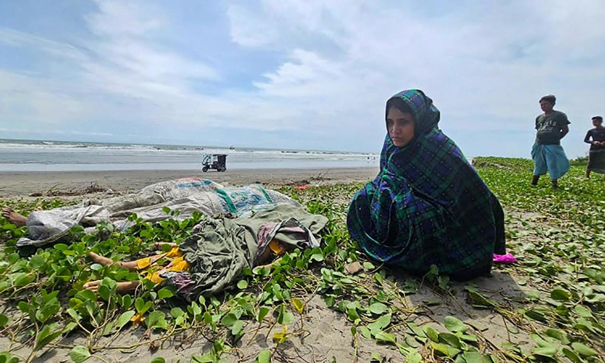 <span>People mourn near the bodies of Rohingya refugees who drowned in the Naf River last week.</span><span>Photograph: AFP/Getty Images</span>