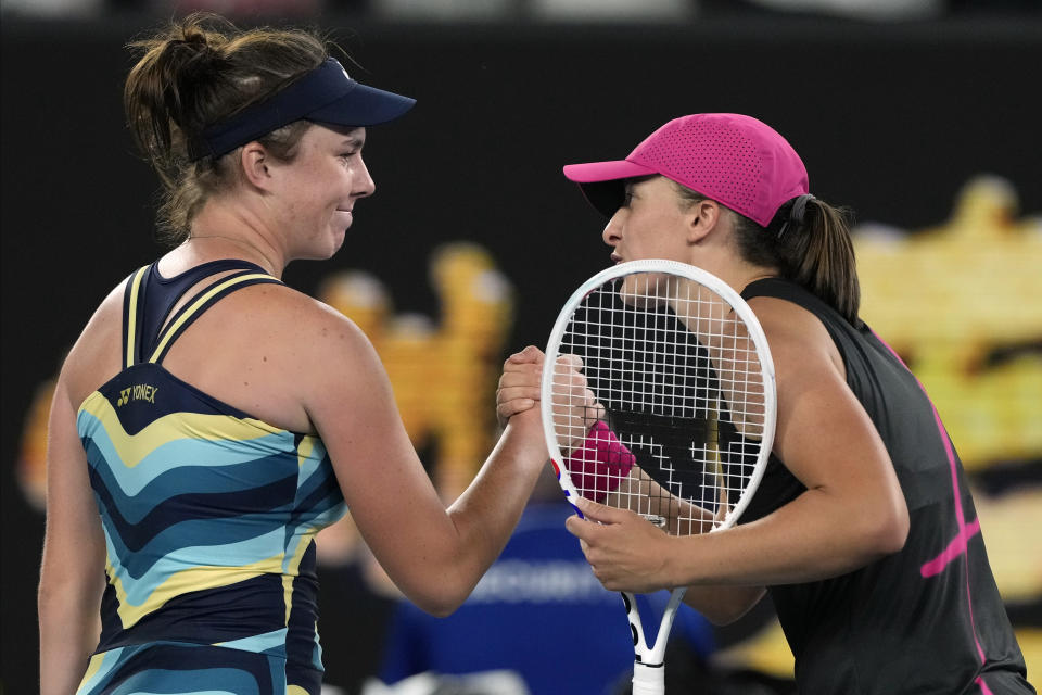 Linda Noskova, left, of the Czech Republic is congratulated by g Iga Swiatek of Poland following their third round match at the Australian Open tennis championships at Melbourne Park, Melbourne, Australia, Saturday, Jan. 20, 2024. (AP Photo/Andy Wong)