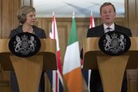 Britain's Prime Minister Theresa May (L) and Irish Taoiseach Enda Kenny hold a joint news conference inside 10 Downing Street, London, Britain July 26, 2016. REUTERS/Stefan Rousseau/Pool