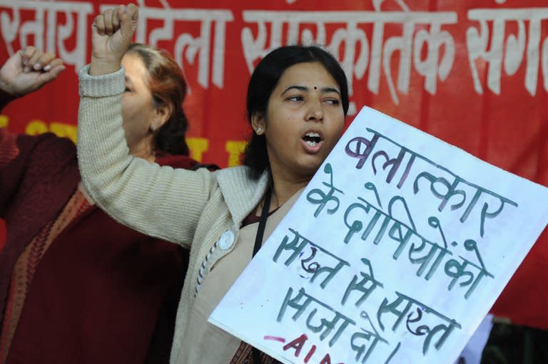 Indian women shout slogans during a protest following the gang-rape of a student in New Delhi on December 18, 2012. New Delhi's police chief has demanded the death penalty for rapists amid growing outrage over the gang-rape of a 23-year-old student on a school bus in the city