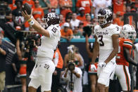 Texas A&M quarterback Conner Weigman (15) reacts after scoring a touchdown during the first half of an NCAA college football game against Miami, Saturday, Sept. 9, 2023, in Miami Gardens, Fla. (AP Photo/Lynne Sladky)