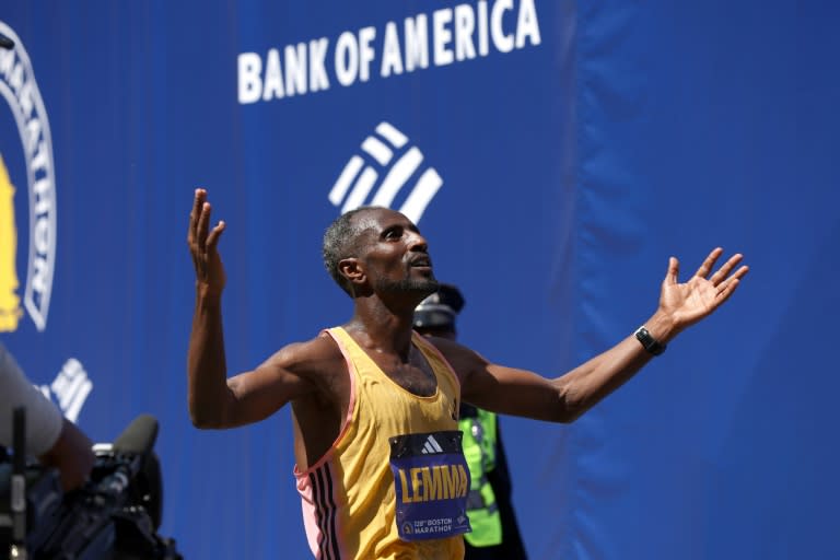 Ethiopia's Sisay Lemma celebrates his victory in the 2024 Boston Marathon (Paul Rutherford)