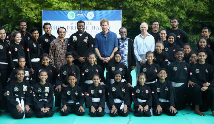 SINGAPORE - JUNE 04: Prince Harry poses for a photo after watching a martial arts demonstration at Jamiyah Singapore on the first day of a two day visit to Singapore on June 4, 2017 in Singapore. (Photo by Chris Jackson/Getty Images)