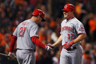 Jay Bruce #32 of the Cincinnati Reds celebrates with teammate Todd Frazier #21 after hitting a solo home run in the fourth inning against the San Francisco Giants during Game One of the National League Division Series at AT&T Park on October 6, 2012 in San Francisco, California. (Photo by Jeff Gross/Getty Images)