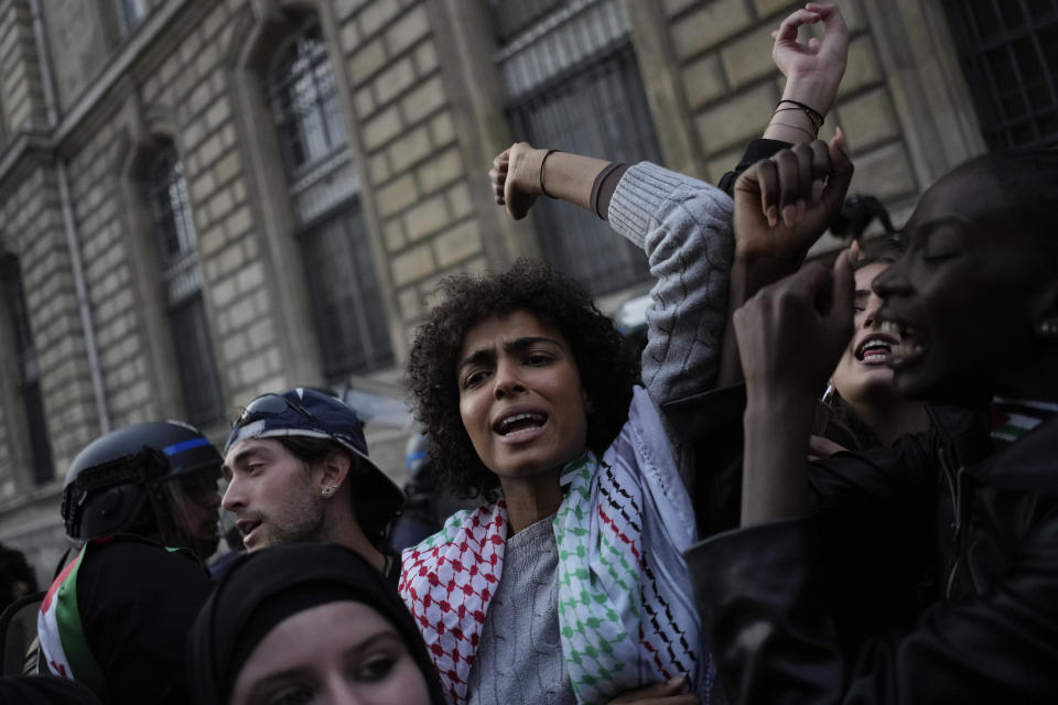 A protestor chants slogans during a rally in solidarity with the Palestinian people in Gaza, in Paris, Thursday, Oct.12, 2023. (AP Photo/Thibault Camus)