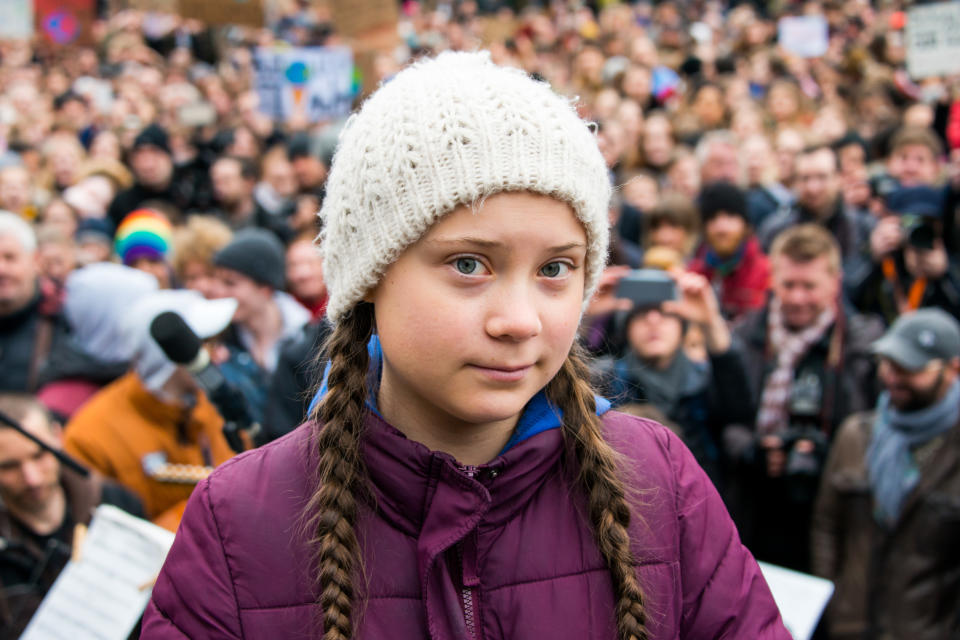 Greta Thunberg, climate activist, stands on a stage during a rally at the town hall market in Hamburg, Germany, on Mar. 1, 2019.