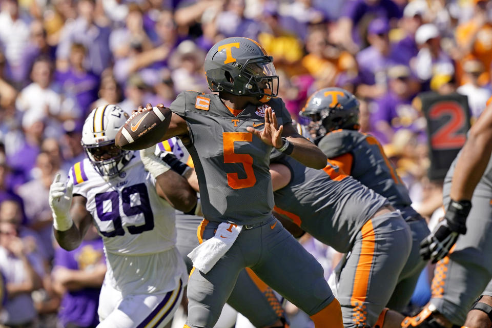 Tennessee quarterback Hendon Hooker (5) passes in the first half of an NCAA college football game against LSU in Baton Rouge, La., Saturday, Oct. 8, 2022. (AP Photo/Gerald Herbert)
