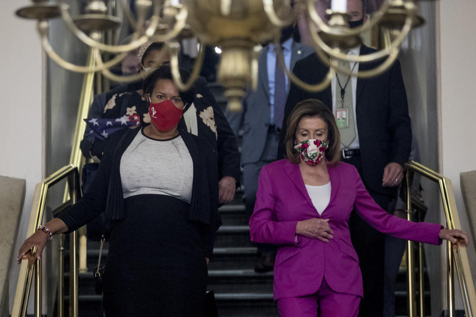 House Speaker Nancy Pelosi of Calif., right, and District of Columbia Mayor Muriel Bowser, left, arrive for a news conference on D.C. statehood on Capitol Hill, Tuesday, June 16, 2020, in Washington. (AP Photo/Andrew Harnik)