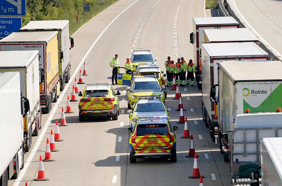 Lorries queue for the Port of Dover along the M20 near Ashford in Kent as security checks are being carried out at the port amid an ongoing effort to track down escaped terrorism suspect, Daniel Abed Khalife. Picture date: Thursday September 7, 2023.