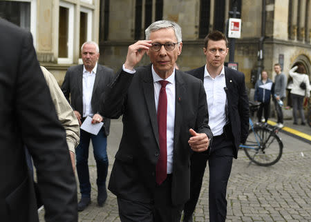 Carsten Sieling, Bremen's mayor and top candidate of the Social Democrats (SPD) for the German city-state of Bremen parliamentary elections walks after first election polls were published in Bremen, Germany, May 26, 2019. REUTERS/Fabian Bimmer