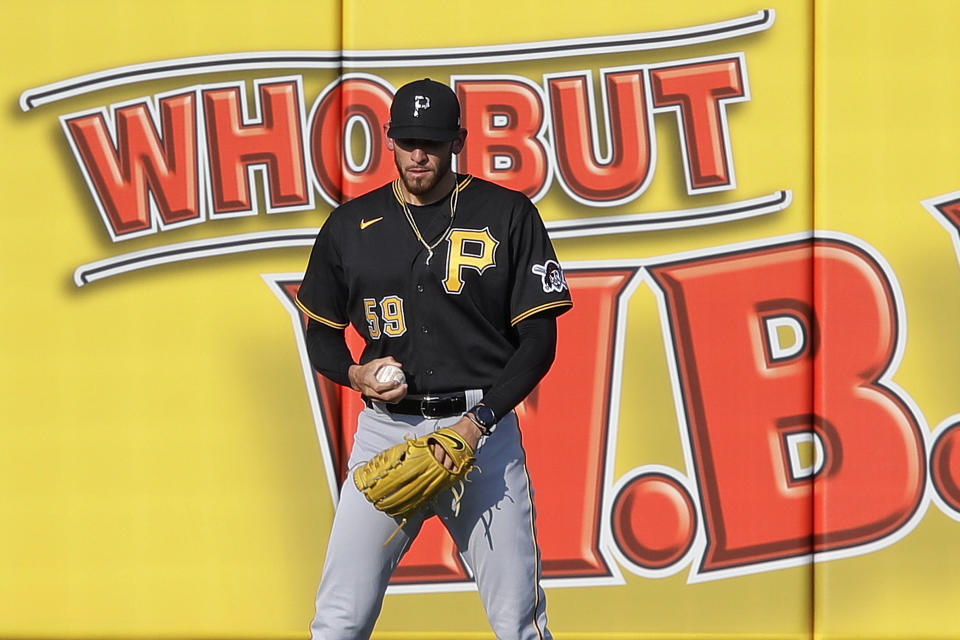 Pittsburgh Pirates pitcher Joe Musgrove warms up in the outfield before pitching in a simulated game at the baseball team's practice in Pittsburgh, Wednesday, July 8, 2020. (AP Photo/Gene J. Puskar)