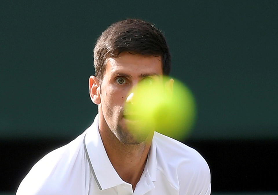 Tennis - Wimbledon - All England Lawn Tennis and Croquet Club, London, Britain - July 14, 2019  Serbia's Novak Djokovic in action during the final against Switzerland's Roger Federer  REUTERS/Toby Melville     TPX IMAGES OF THE DAY