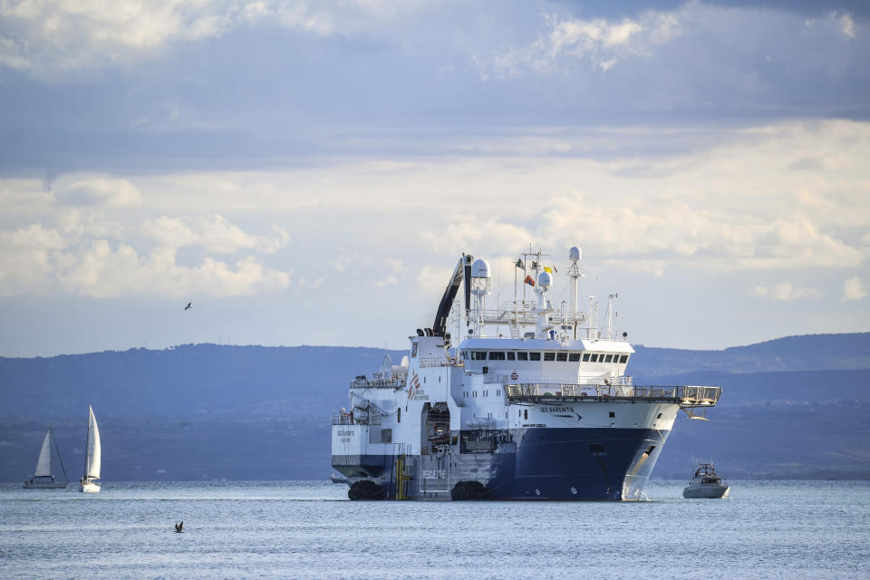 The Norway-flagged Geo Barents rescue ship carrying 572 migrants arrives at Catania's port, Sicily, southern Italy, Sunday, Nov. 6, 2022. The Geo Barents, and the German-flagged Humanity1 have been allowed to disembark what the Italian authorities defined "vulnerable people" and minors, while other two ships carrying rescued migrants remained at sea. (AP Photo/Salvatore Cavalli)