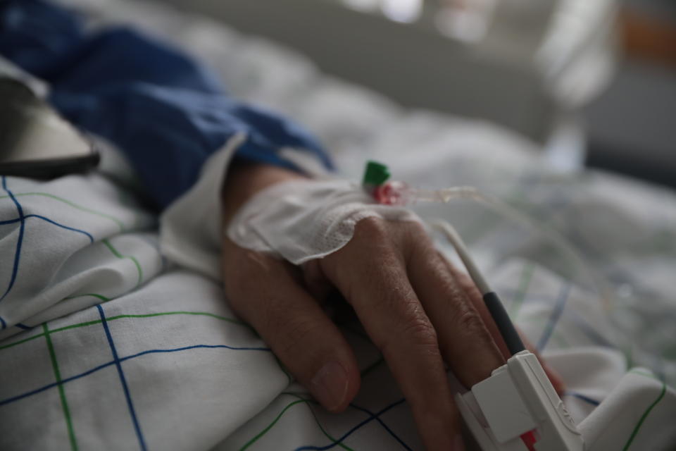 In this photo taken on Wednesday, April 15, 2020, a COVID-19 patient lies on a bed at one of the intensive care units (ICU) of the Moulay Abdellah hospital in Sale, Morocco. Coronavirus has upended life for Morocco's medical workers. They enjoy better medical facilities than in much of Africa but are often short of the equipment available in European hospitals, which also found themselves overwhelmed. (AP Photo/Mosa'ab Elshamy)