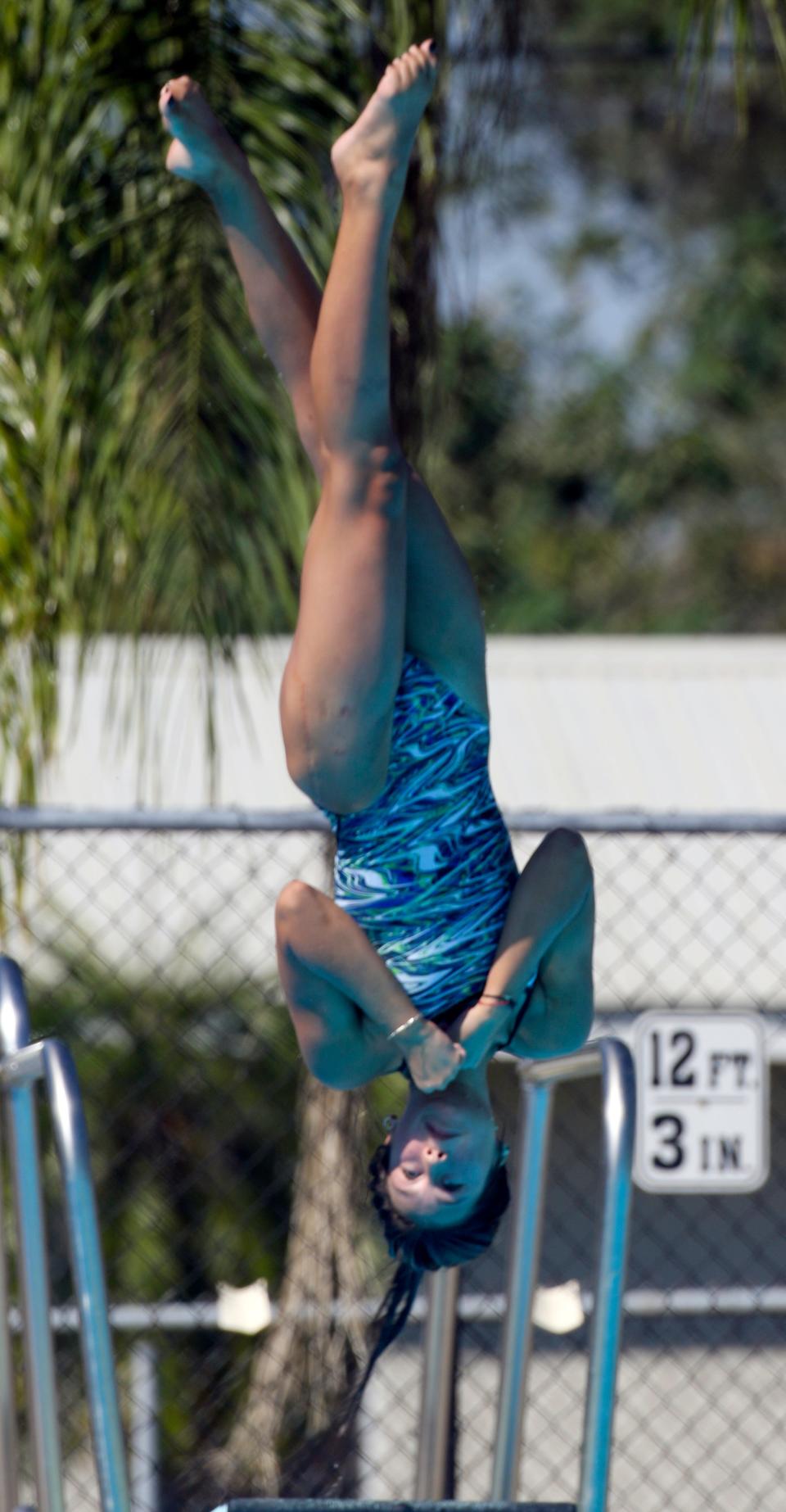 McKeel's Haidyn Beall competes in the girls diving competition at the 2022 Polk County Swimming and Diving Championship.