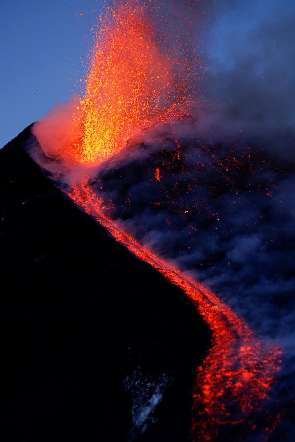 <p>Mount Etna, Europe’s most active volcano, spews lava during an eruption, near the Sicilian town of Catania, southern Italy, Tuesday, Feb. 28, 2017. (Antonio Parrinello/Reuters) </p>