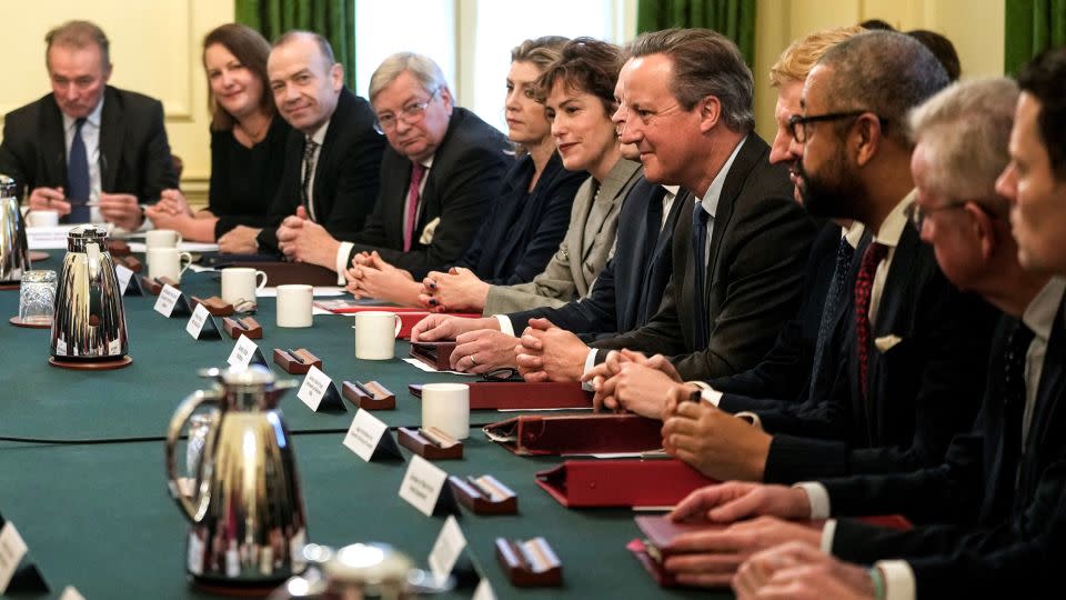 Former British Prime Minister David Cameron (5th from right), who resigned following the 2016 Brexit vote, returned to front-line politics this year. - Kin Cheung/AFP/Getty Images