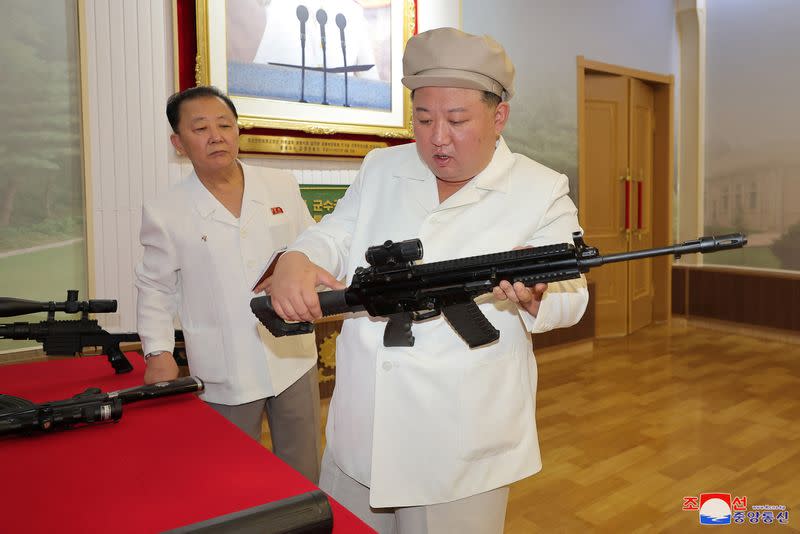 North Korean leader Kim Jong Un gives field guidance at a major weapon factory