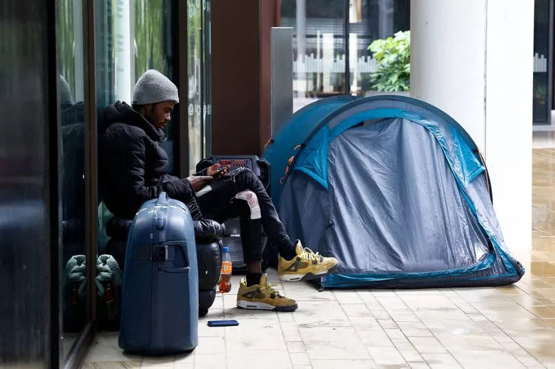 Sabber Zidin sat next to his tent outside the Camden Council building in King's Cross