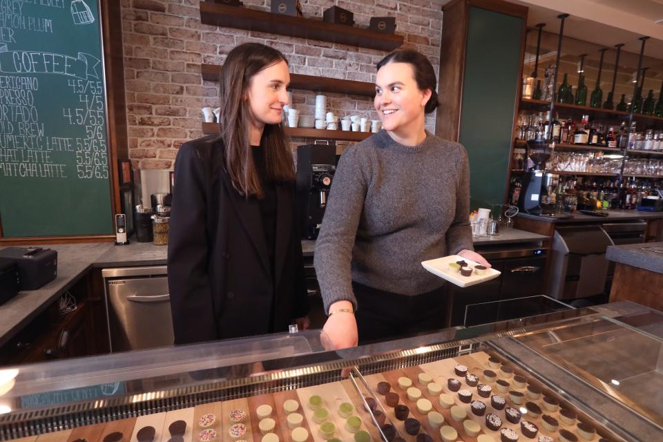 Sisters Carrie Denoyer, left, and Charlotte Denoyer at Cafe Deux in Harrison March 17, 2023.