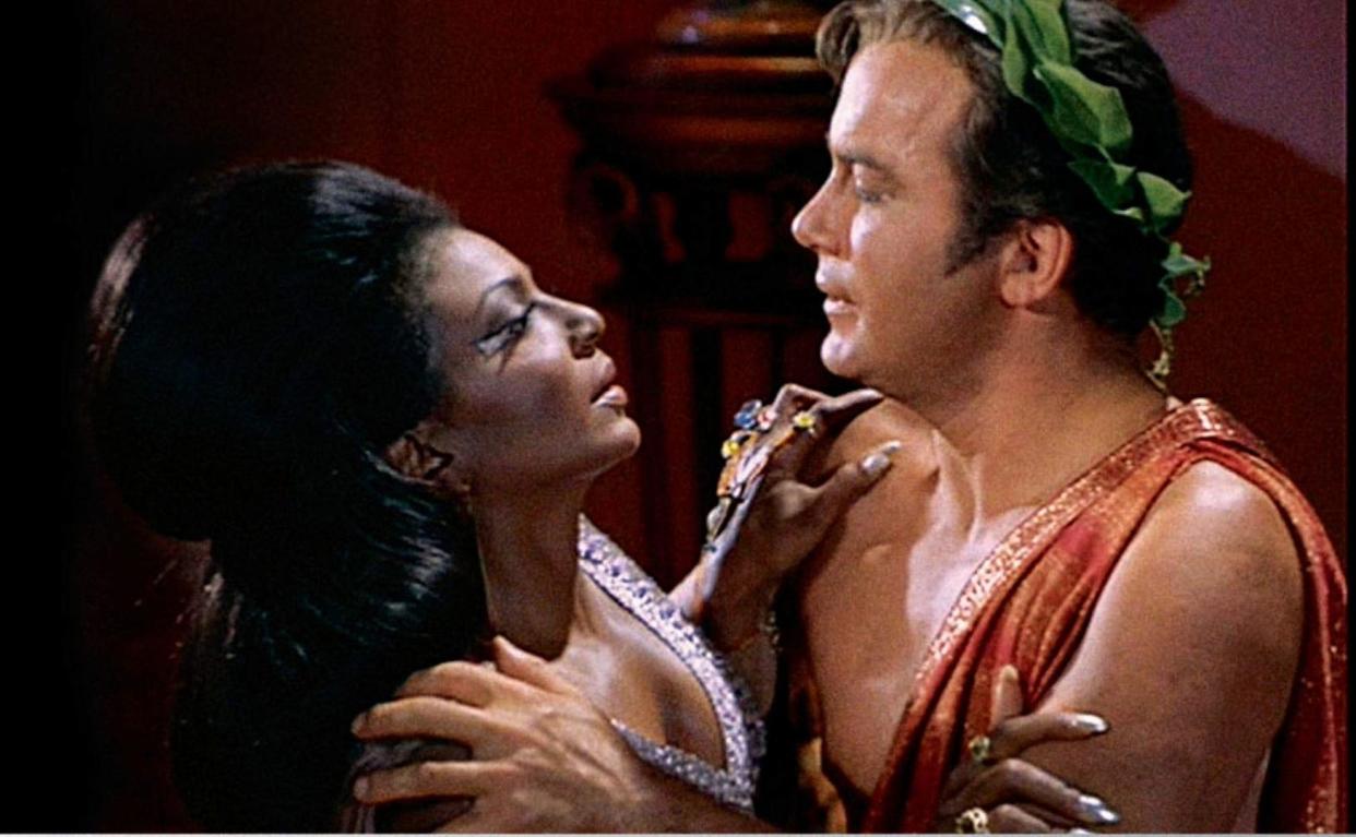 Nichelle Nichols and William Shatner share the first interracial kiss on television during the "Plato's Stepchildren" episode of "Star Trek.," which aired in 1966.