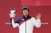 <p>Sungbin Yun of Korea celebrates winning gold in the Men’s Skeleton at Olympic Sliding Centre on February 16, 2018 in Pyeongchang-gun, South Korea. (Getty) </p>