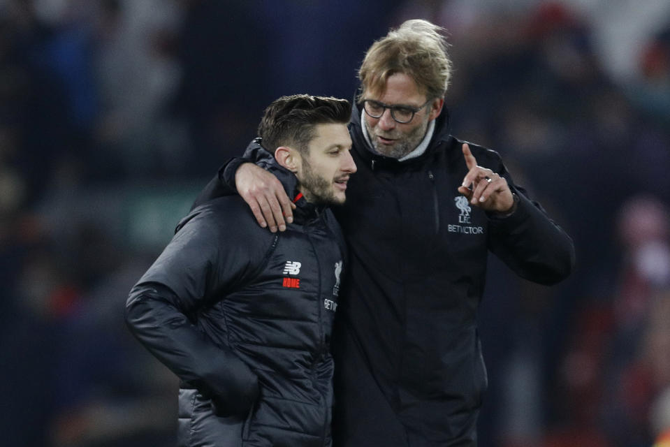 Britain Football Soccer - Liverpool v Stoke City - Premier League - Anfield - 27/12/16 Liverpool manager Juergen Klopp celebrates with Adam Lallana at the end of the match  Reuters / Darren Staples Livepic EDITORIAL USE ONLY. No use with unauthorized audio, video, data, fixture lists, club/league logos or "live" services. Online in-match use limited to 45 images, no video emulation. No use in betting, games or single club/league/player publications. Please contact your account representative for further details.